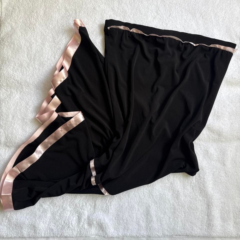 pink and black asymmetrical skirt with pink ribbon
